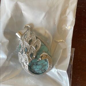 Elegant Silver and Turquoise Peacock Pendant